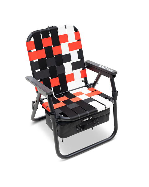 Top down front view of Parkit Chair featuring red, black and white fabric and a built in black cooler beneath the chair. Birdwell logo on left chair arm in white.