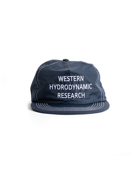Front view of Navy WHR hat with Western Hydronamic Research embroidered in white.