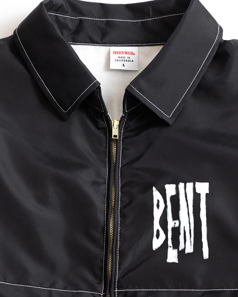 Black jacket with 'BENT' screen printed in white background