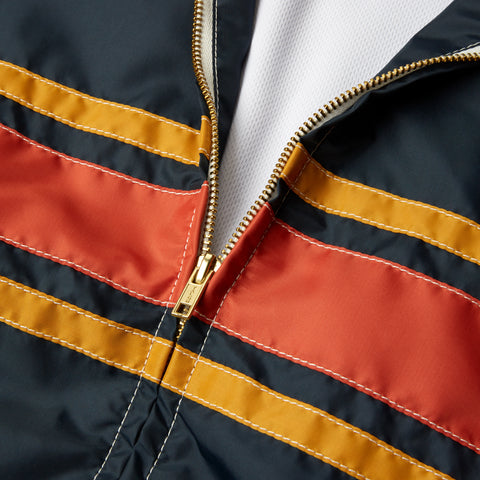 3StripeCompetitionJacket_Mens_Outerwear_NavyPaprikaGold_up_close_zipper