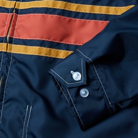 3StripeCompetitionJacket_Mens_Outerwear_NavyPaprikaGold_up_close_sleeve